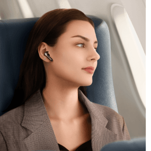 photo of a woman wearing SoundPEATS Air5 Pro Earbds