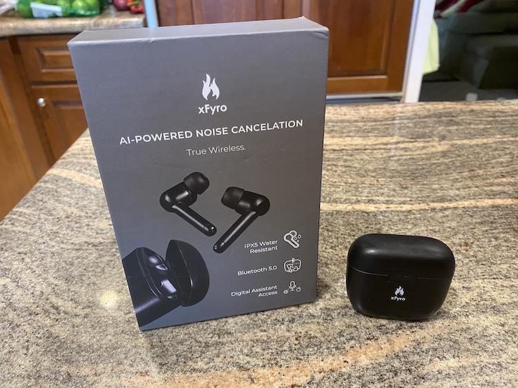 xFyro AI-Powered Noise Cancelation Pro True Wireless Earbuds on a countertop