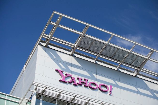 The Yahoo logo in purple on the side of a building