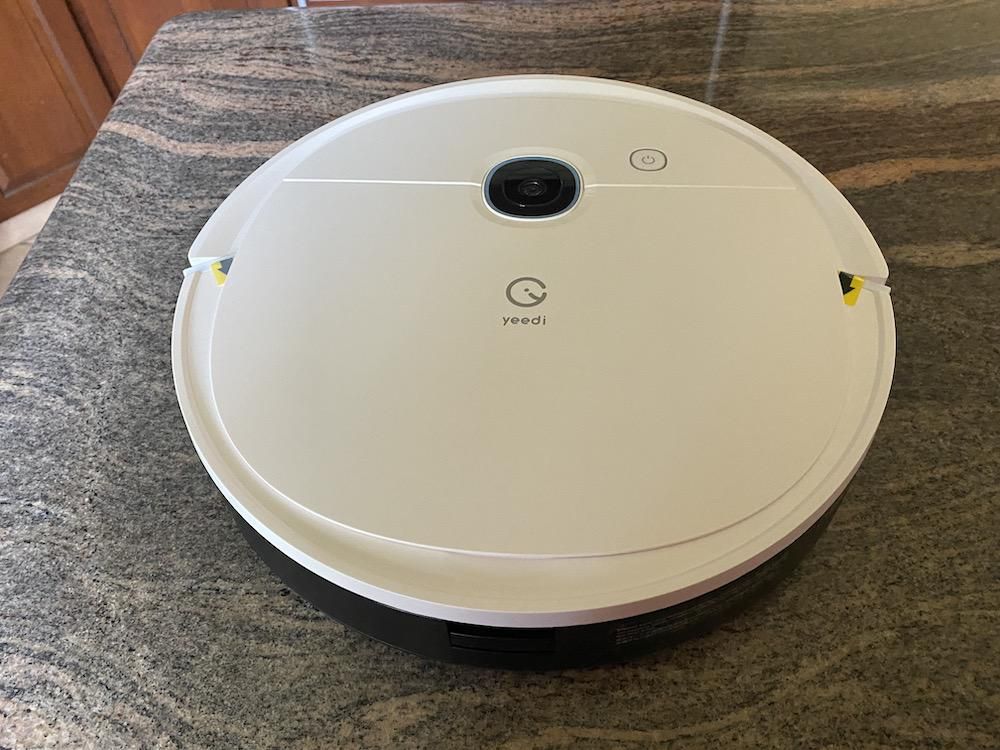 yeedi vac 2 pro robot vacuum on a countertop