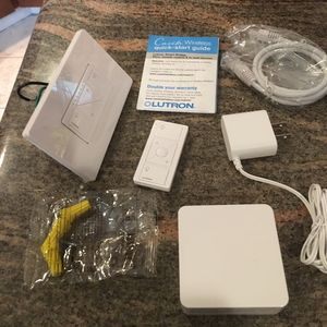 Photo of contents inside Lutron Caseta Dimmer Kit with Smart Bridge