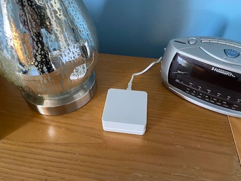 Lutron Caseta repeater on a table