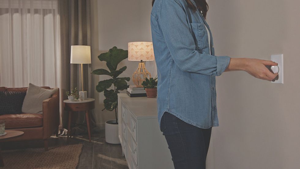 Once installed, the new Lutron Aurora smart bulb dimmer, pictured here, keeps the switch locked into the 'up' position