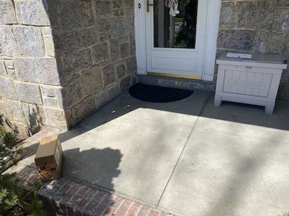 package on porch and not in delivery. box