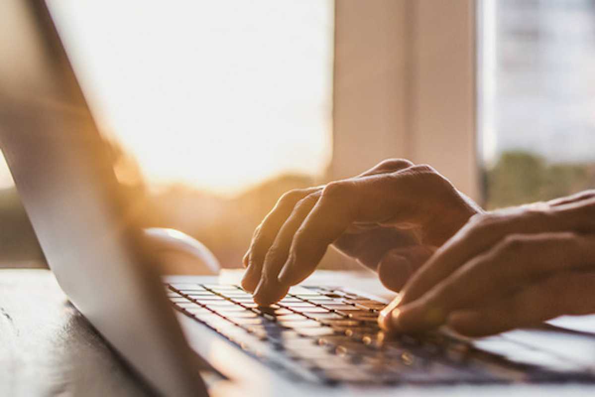 Person at a computer typing