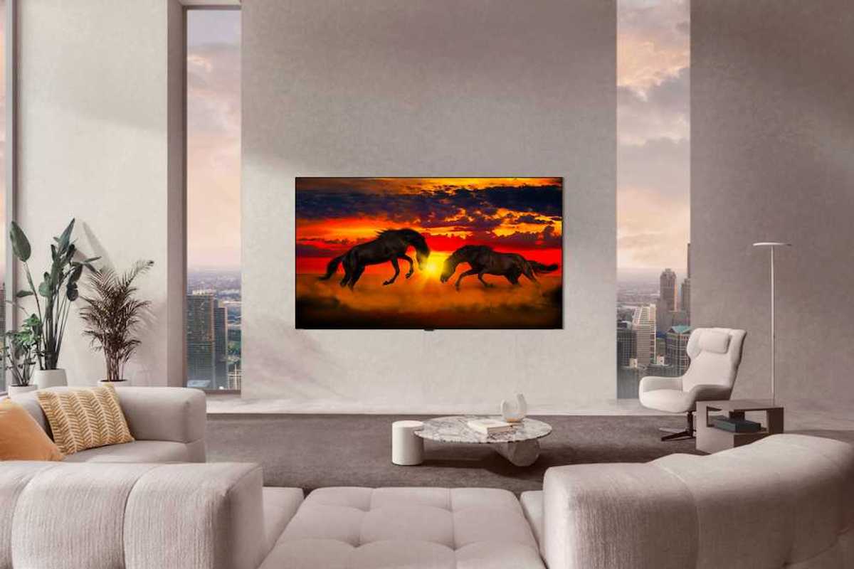 photo of a room with LG OLED evo W6 Wallpaper TV on the wall.