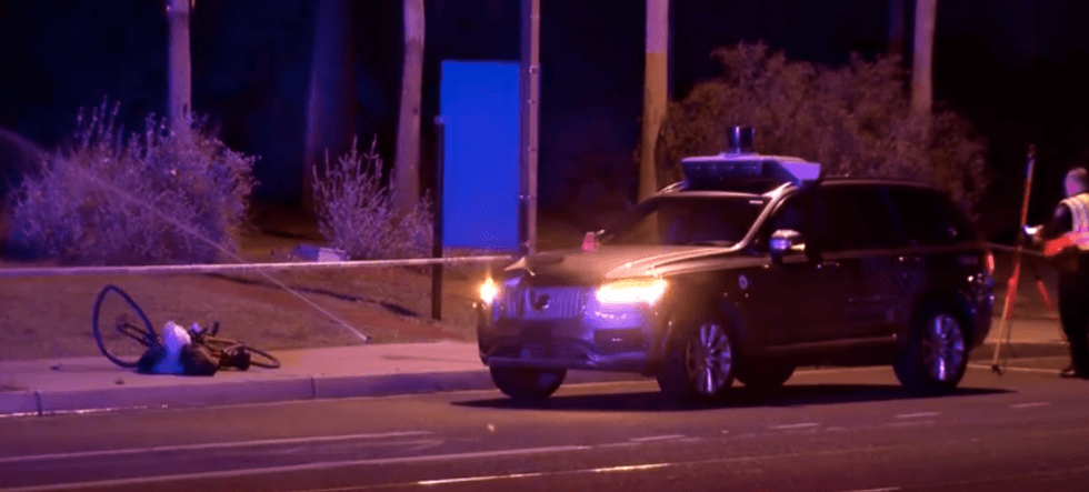 photo of a uber autonomous vehichle on the street