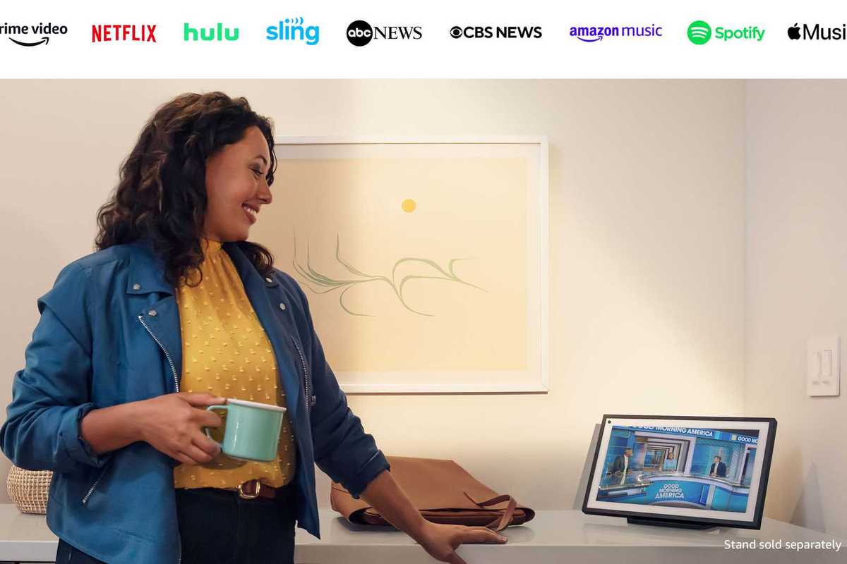 photo of a woman drinking coffee and talking on Echo Show 15