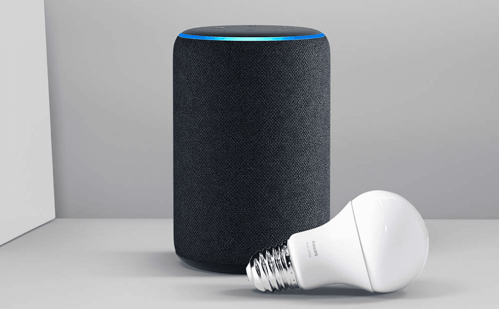 Photo of an Amazon Echo Plus with a smart bulb