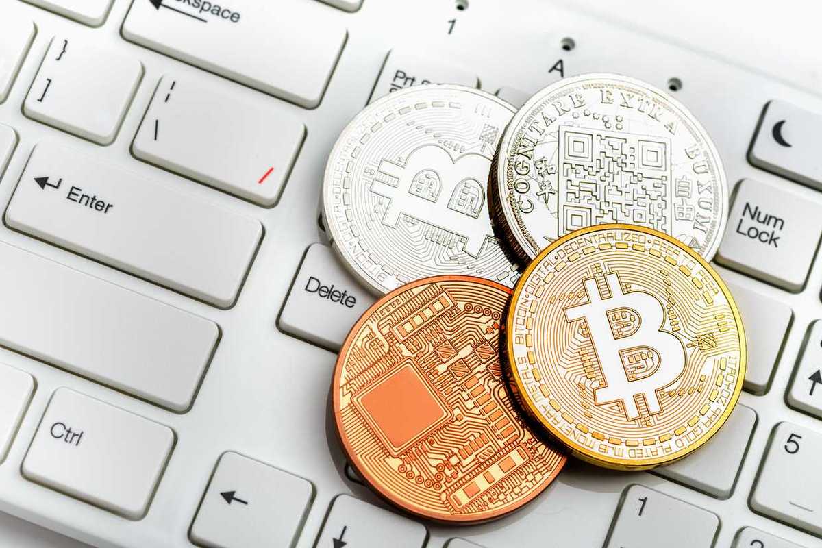 photo of Bitcoiin on white keys