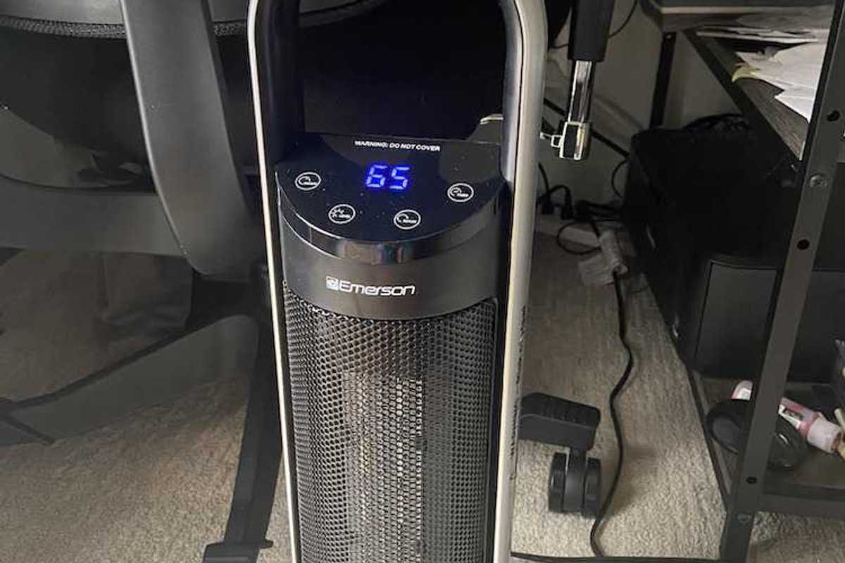 Photo of Emerson SmartVoice 25" Tower Space Heater ES200ER in a home office