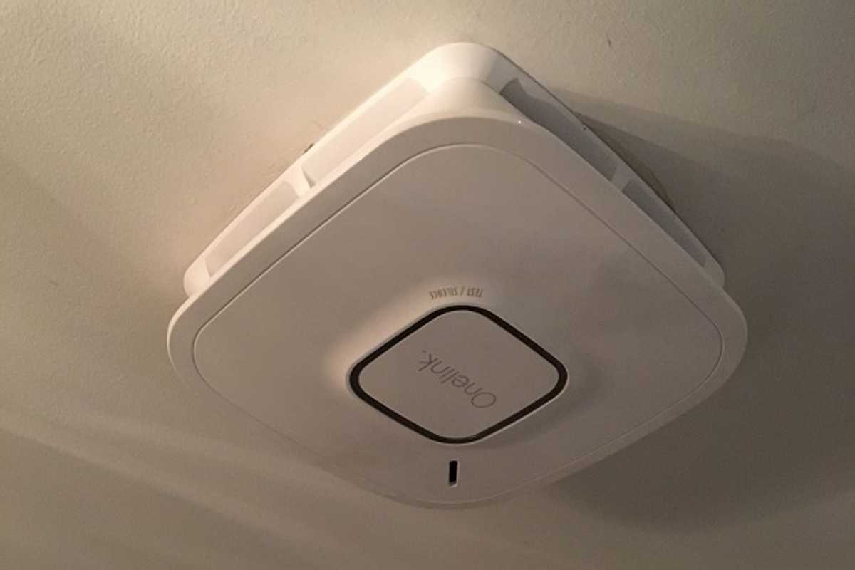 photo of First Alert Onelink Smart Smoke + Carbon Monoxide Alarm on a ceiling.