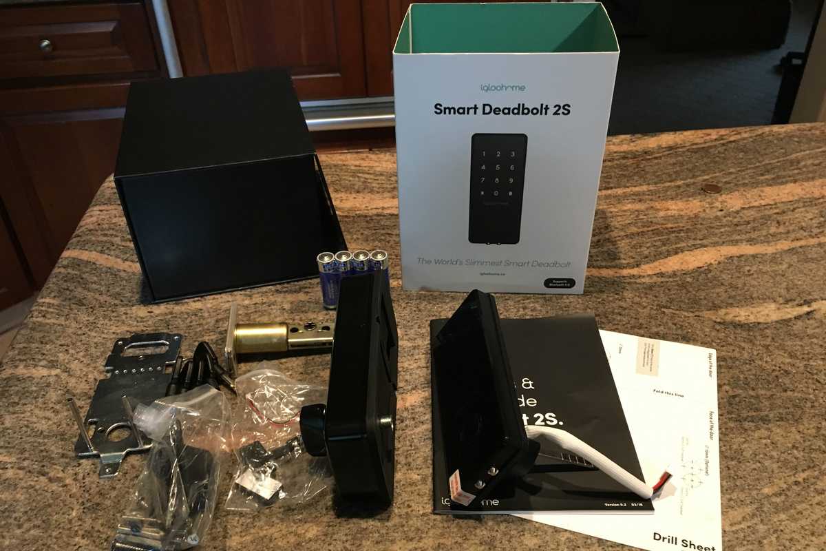 Photo of igloohome deadbolt lock unboxed on a countertop