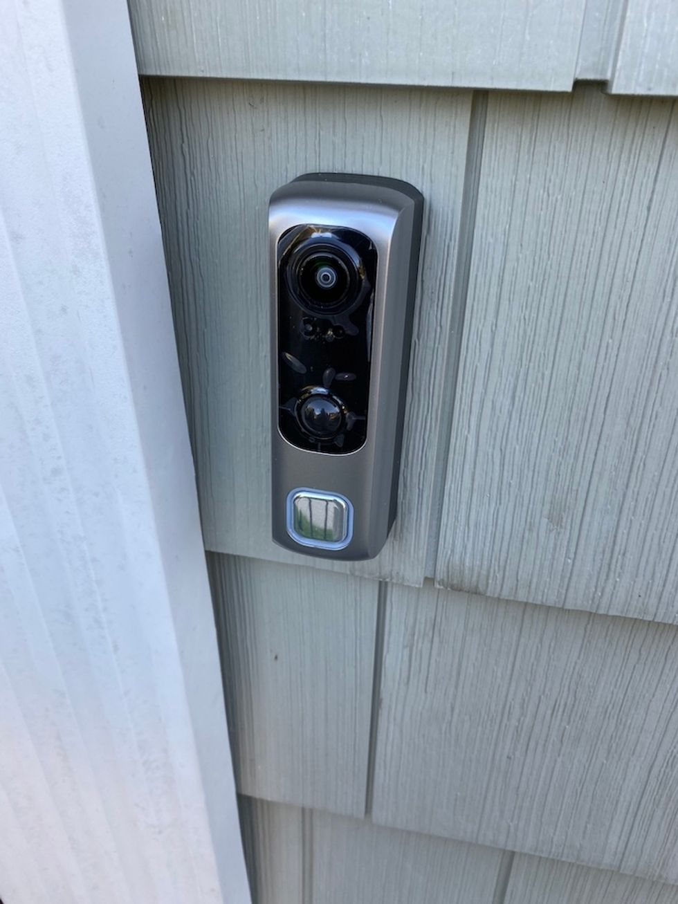 photo of lifeshield video doorbell on the side of a house-