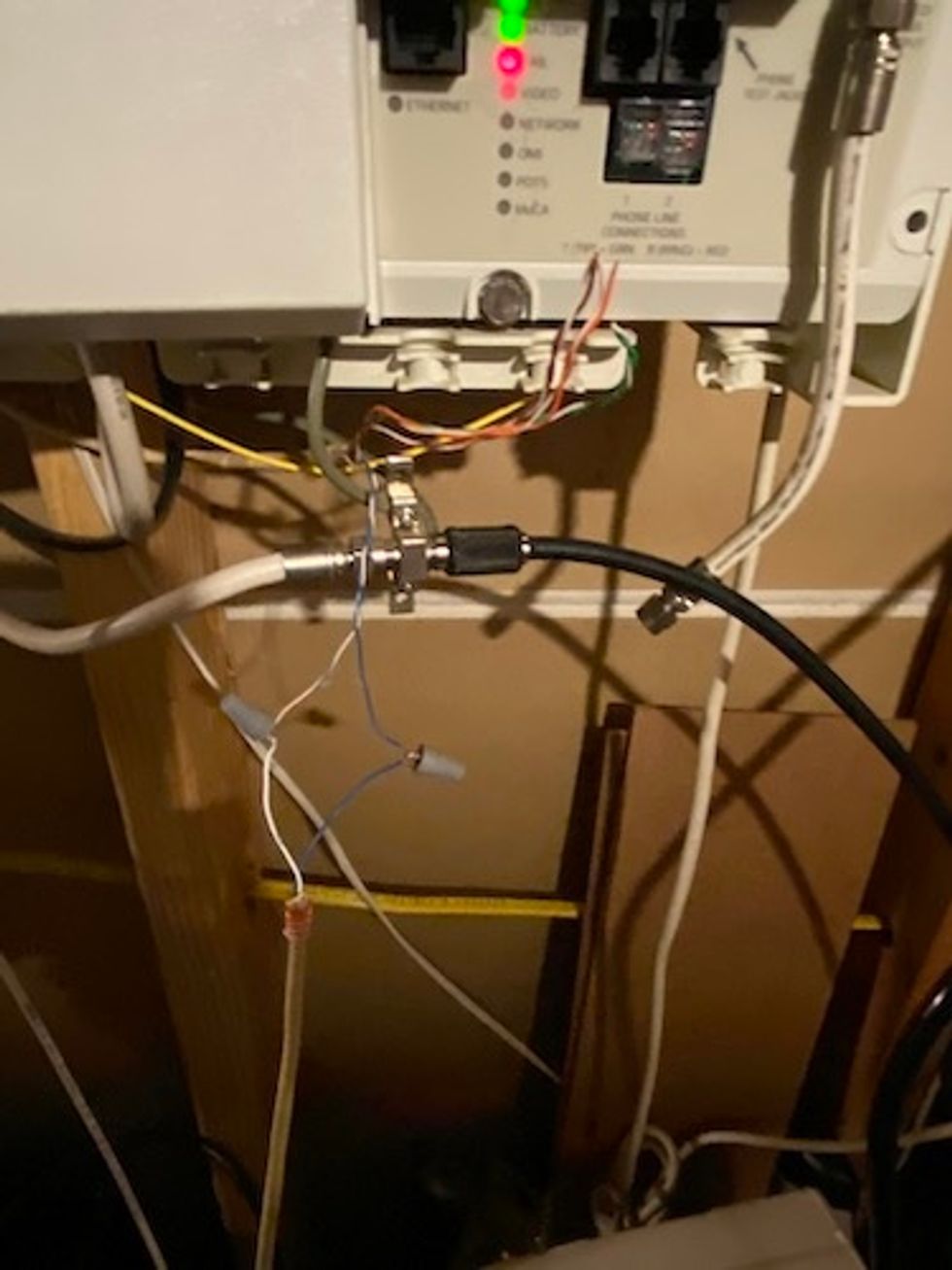 Photo of my old box with new connections to my Verizon gear in the crate