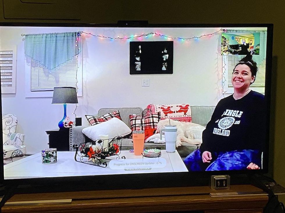 Photo of ONSCREEN video call in progress on a smart TV