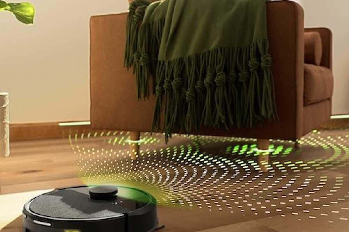 photo of Roomba 105 Series robot vacuum cleaning a floor