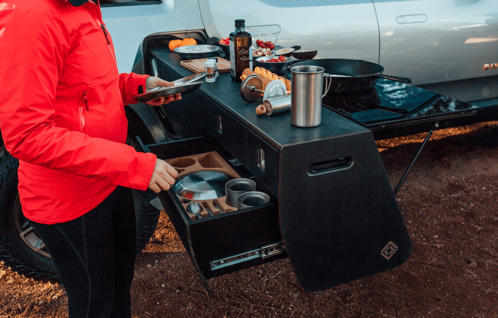 Photo of slide-out kitchen on Rivian R1T electric truck