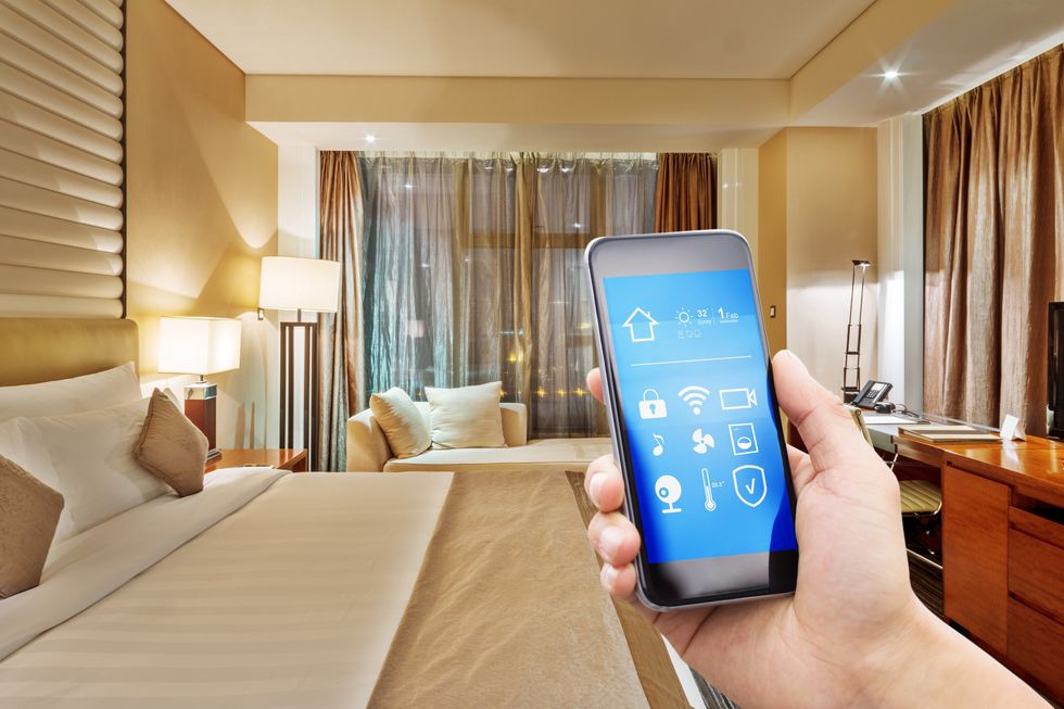 photo of smart phone app for smart lights lighting a room