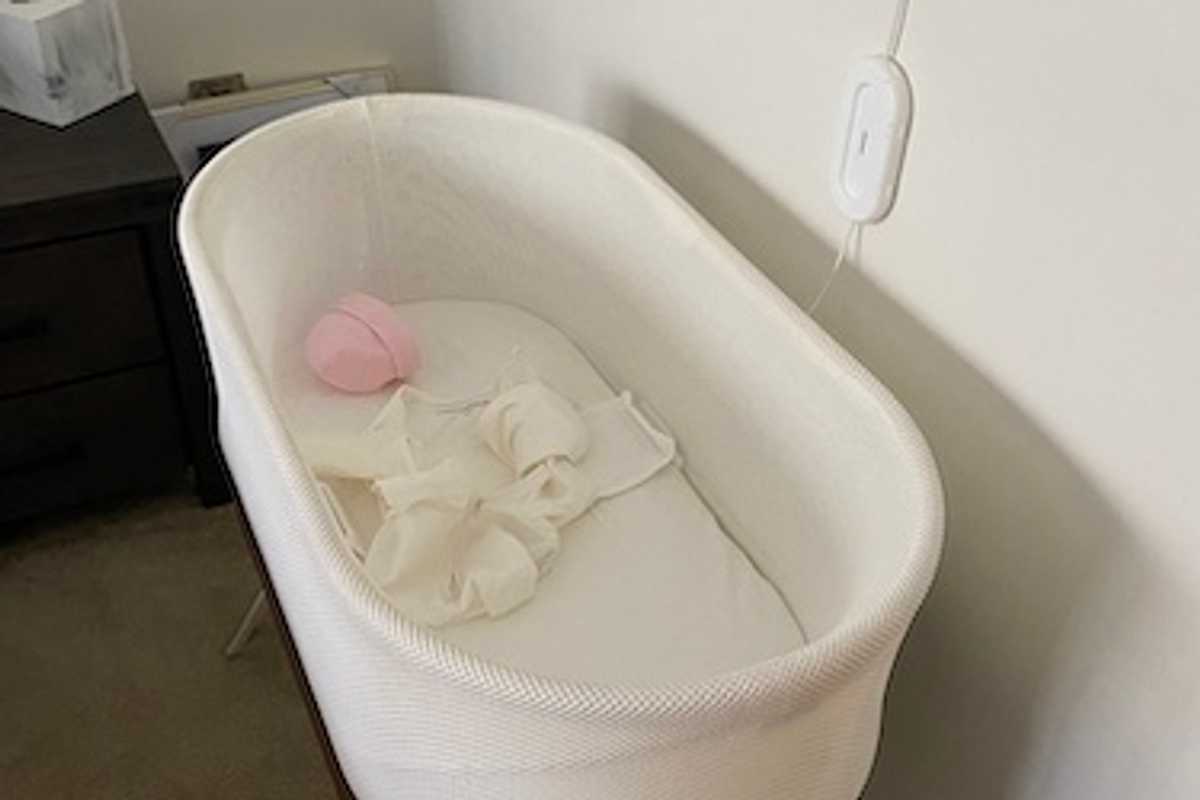 Photo of Snoo Smart Sleeper Bassinet in a bedroom
