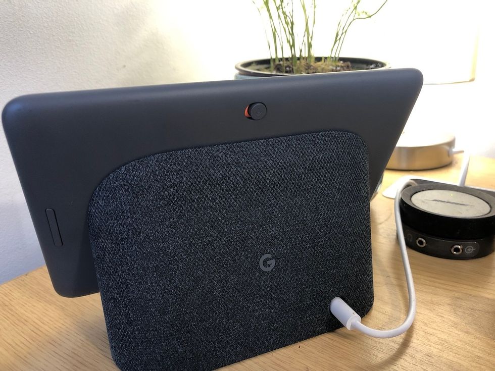 Photo of the back of a Google Home Hub and its mute switch