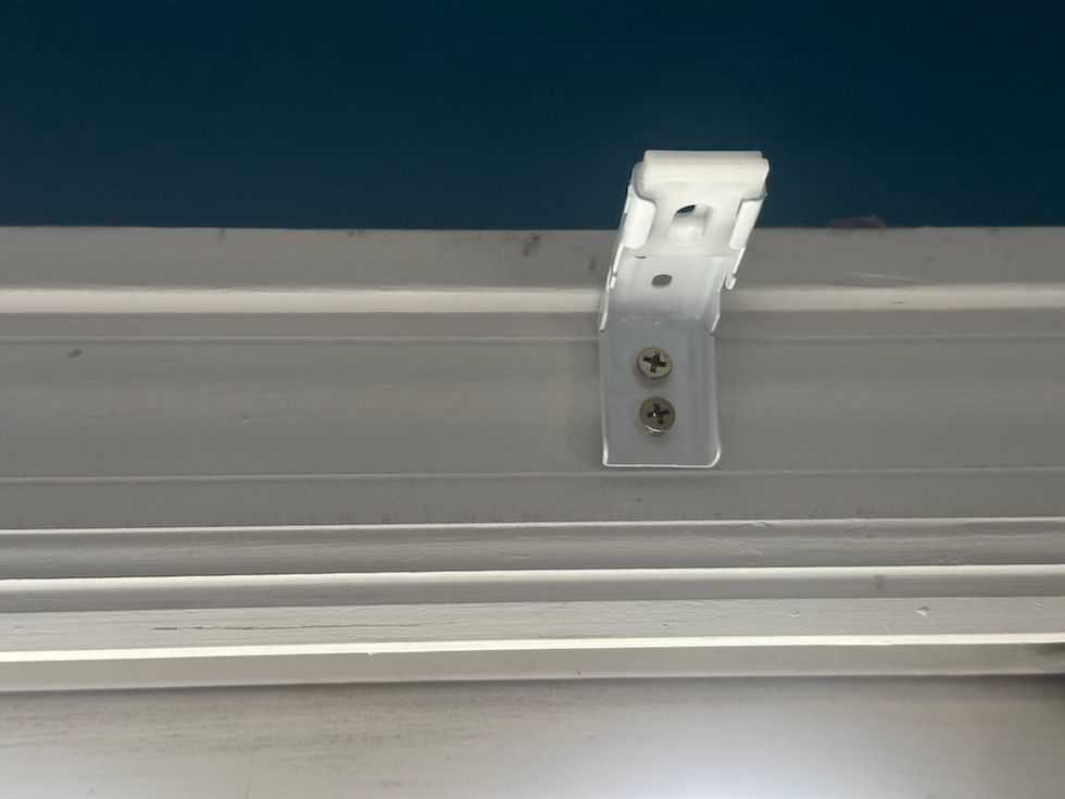 photo of the bracket to hold up Bringnox Smart Blinds