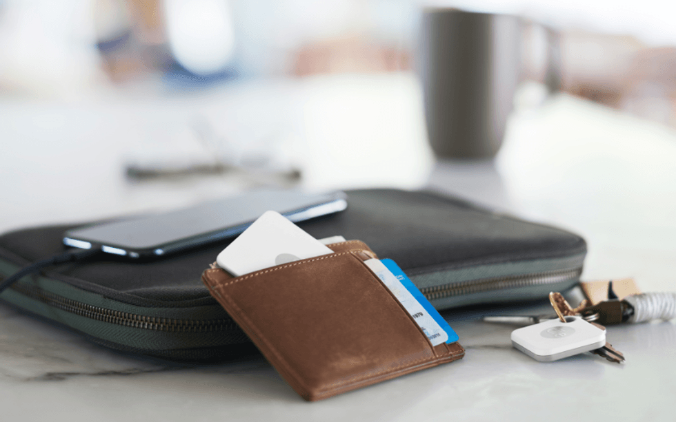 Photo of Tile Bluetooth tracks in a wallet and on a keychain