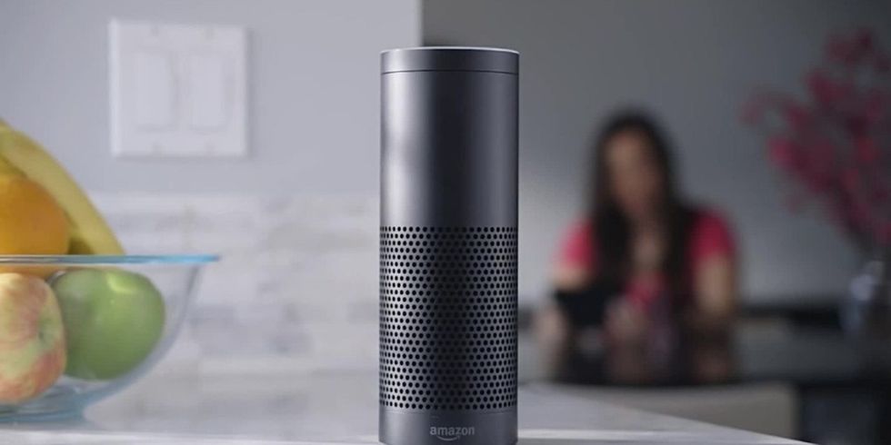 Picture of Amazon Echo on a table top.