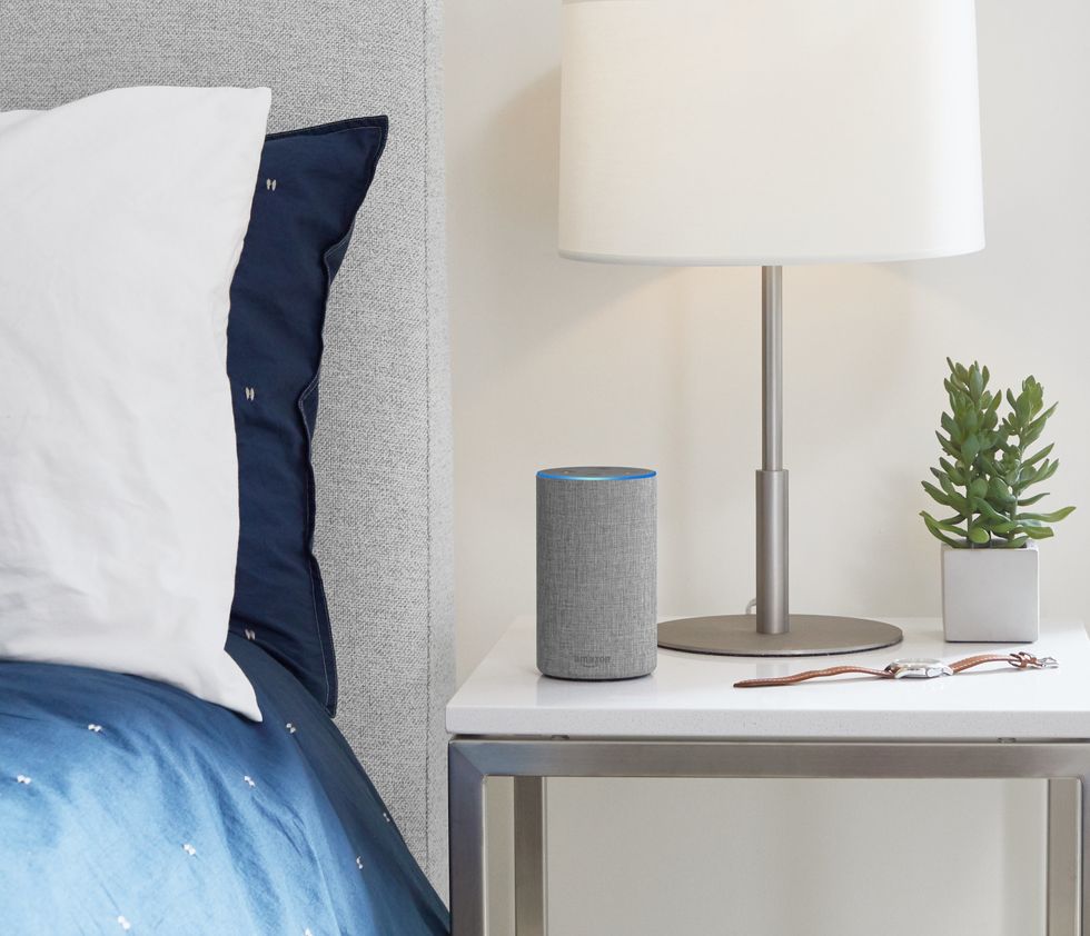Picture of Amazon Echo on night stand.