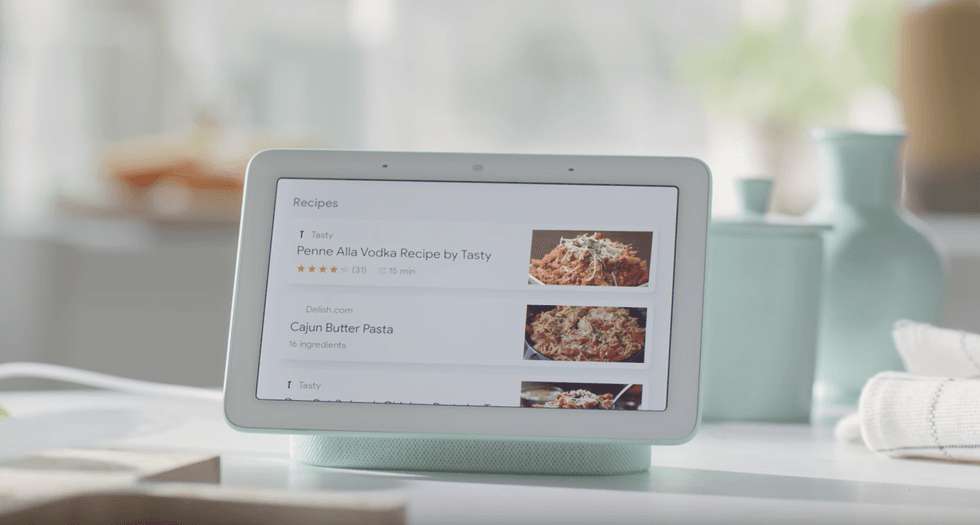 Picture of Home Hub by Google on a kitchen counter.