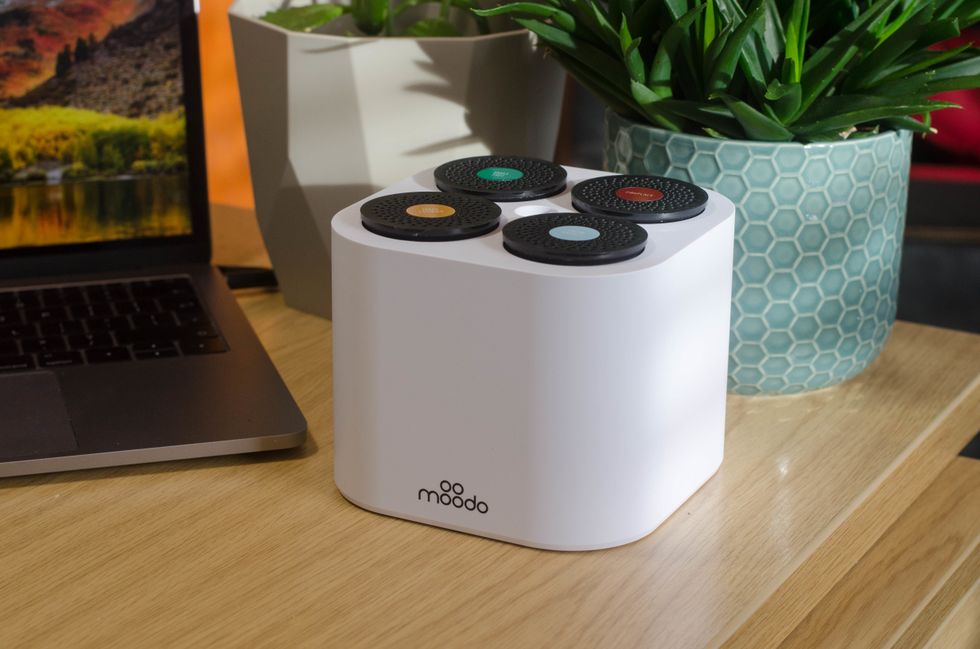 Picture of Moodo Smart Home Fragrance Box on a desk.
