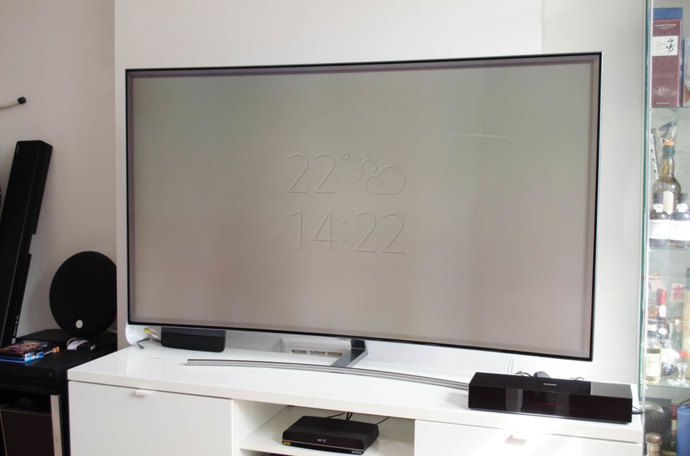 picture of Samsung Q8C Ultra HD television on an entertainment center
