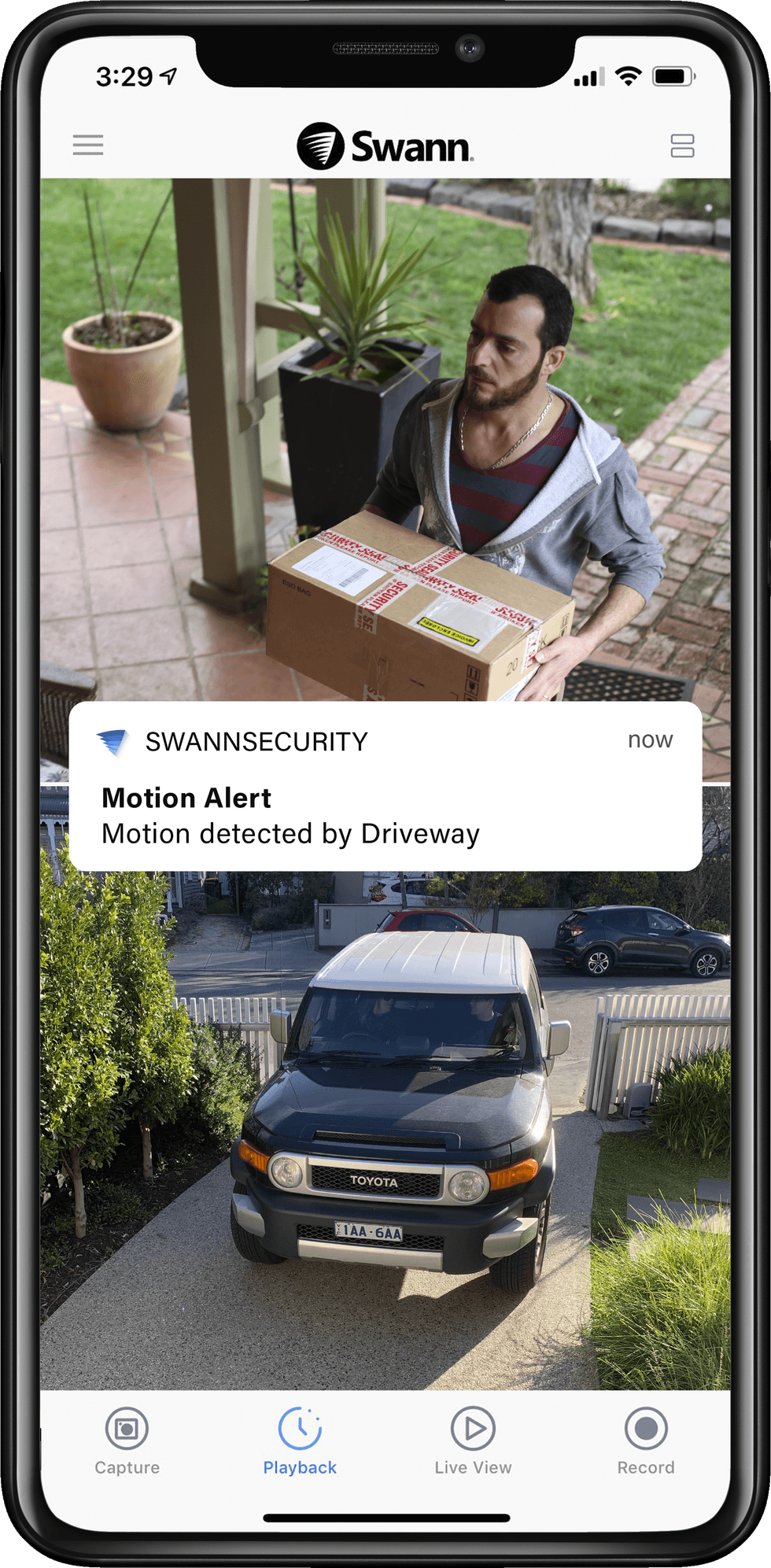 Picture of smartphone with Swann app showing motion alert from video from swann security camera