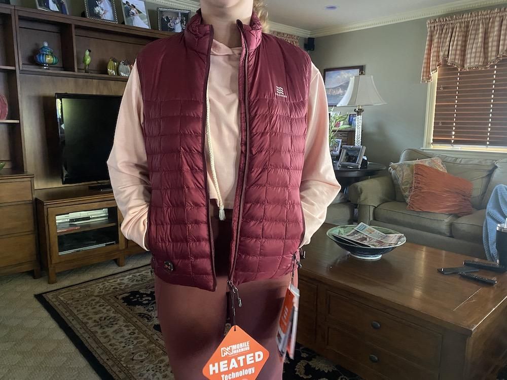a photo of a woman wearing Fieldsheer Mobile Warming Vest