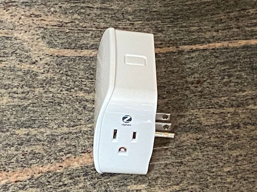 Side view of Enbrighten Plug-in Zigbee smart switch with two outlets