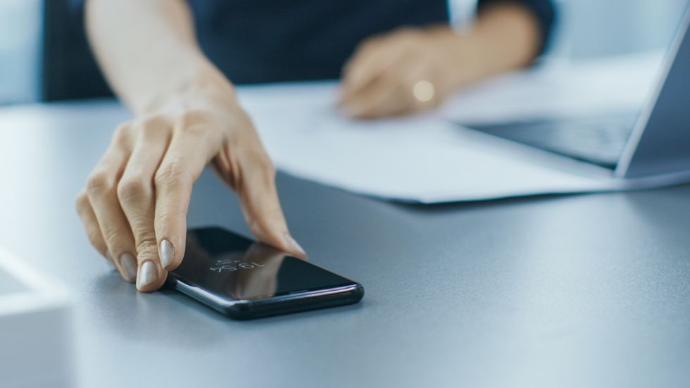 Smartphone use stock image