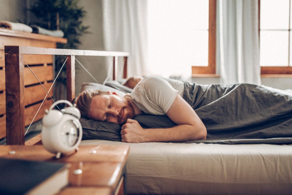 Stock image of a man sleeping