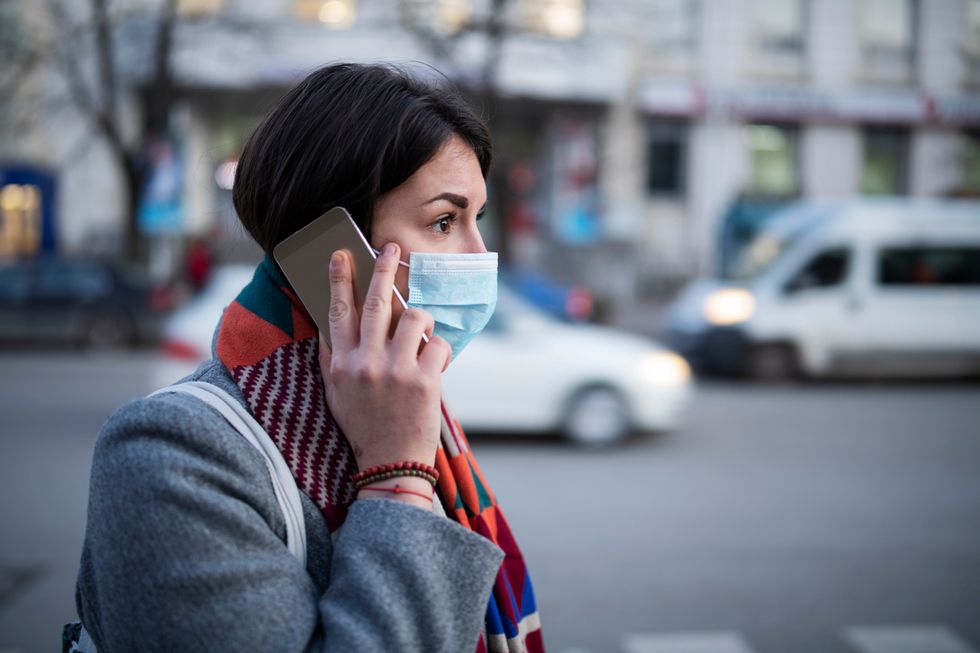 Stock image of woman with a face mask