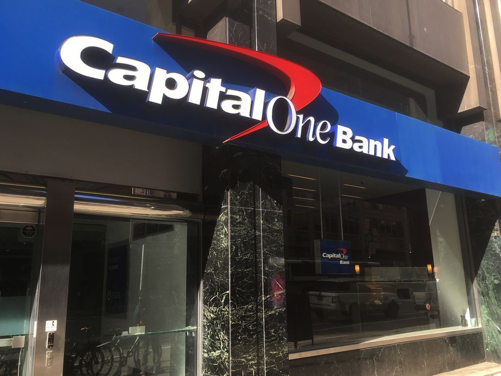 The Capital One Bank logo across a storefront