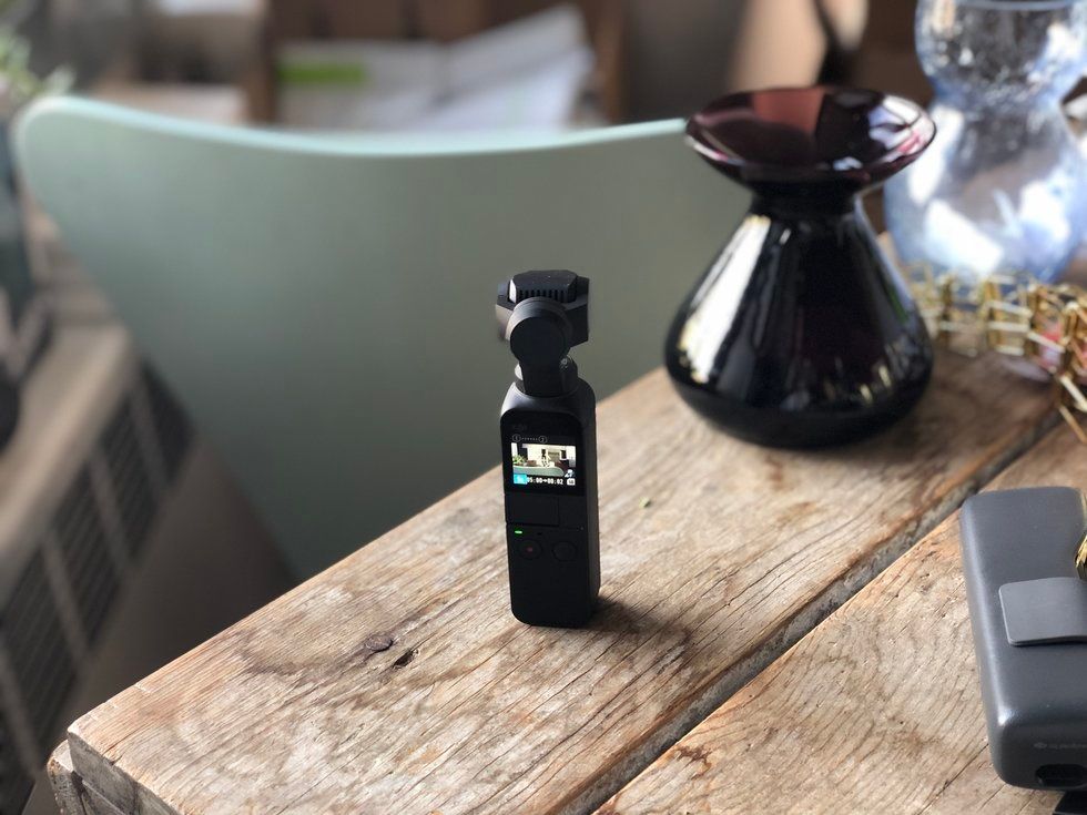 The DJI Osmo Pocket on a wooden table