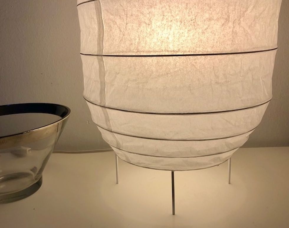 The light, as seen here, from the GE LED+ Speaker bulb is equivalent to a 60-watt bulb, very pleasing and warm