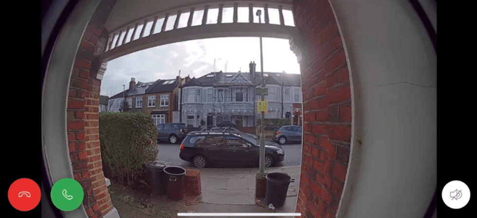 The view of a street through a Ring video doorbell camera