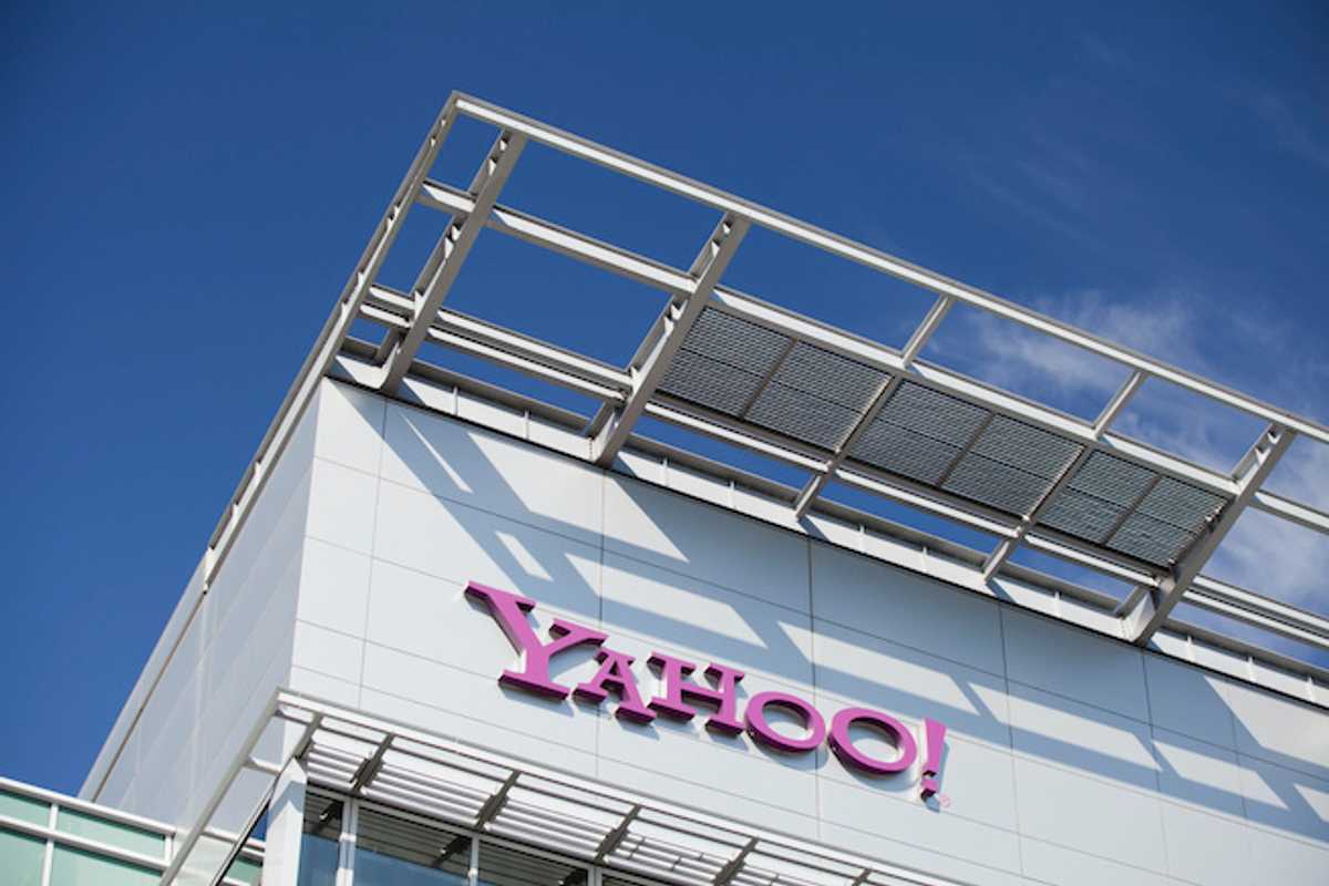 The Yahoo logo in purple on the side of a building
