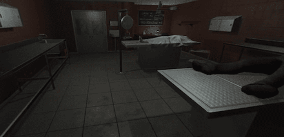 Two bodies lying in a morgue, with a dirty floor