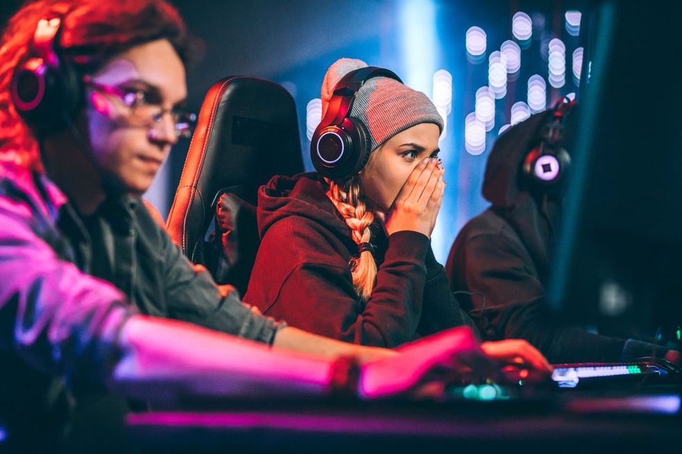 two gamers playing and frustrated with insuffient bandwidth.