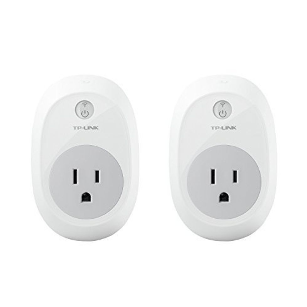 Two TP-Link Smart Plugs in white and gray