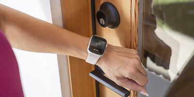 a photo of a Apple Watch unlocking Level Lock+ smart lock