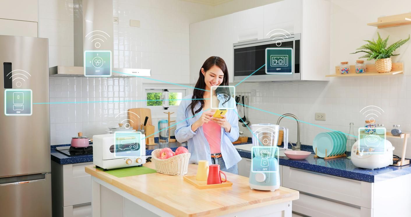 Woman controlling here smart appliances in her smart home.