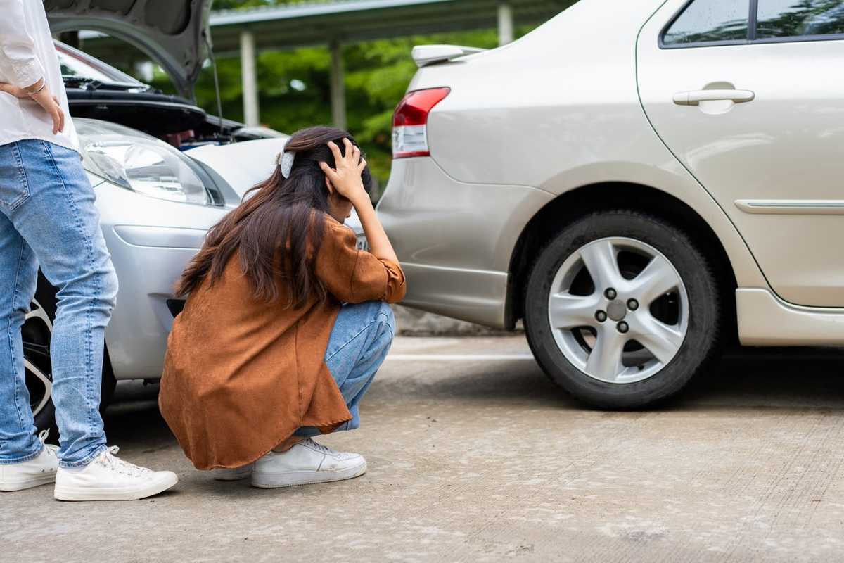 woman freaking out after a car accident