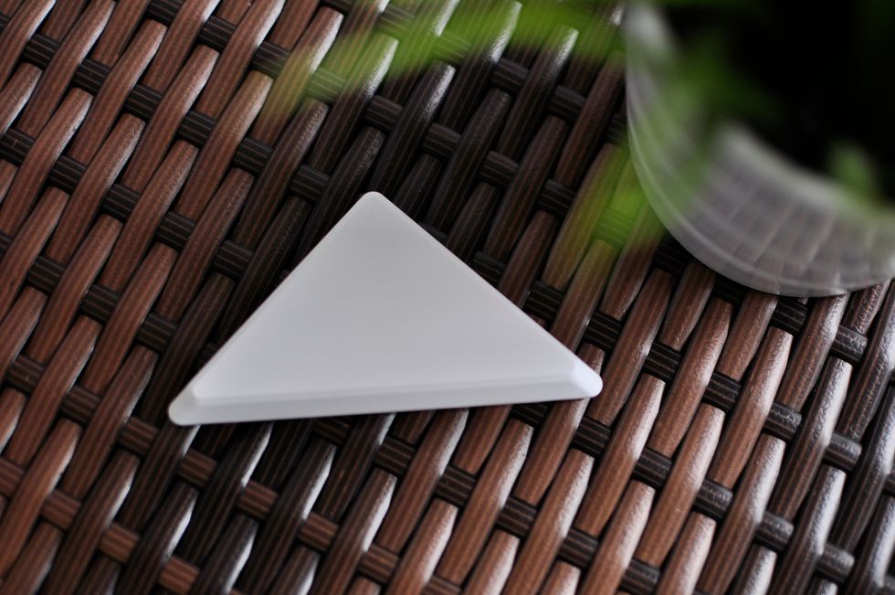 You can paint over Oomi's door sensor to match up the color scheme in your home